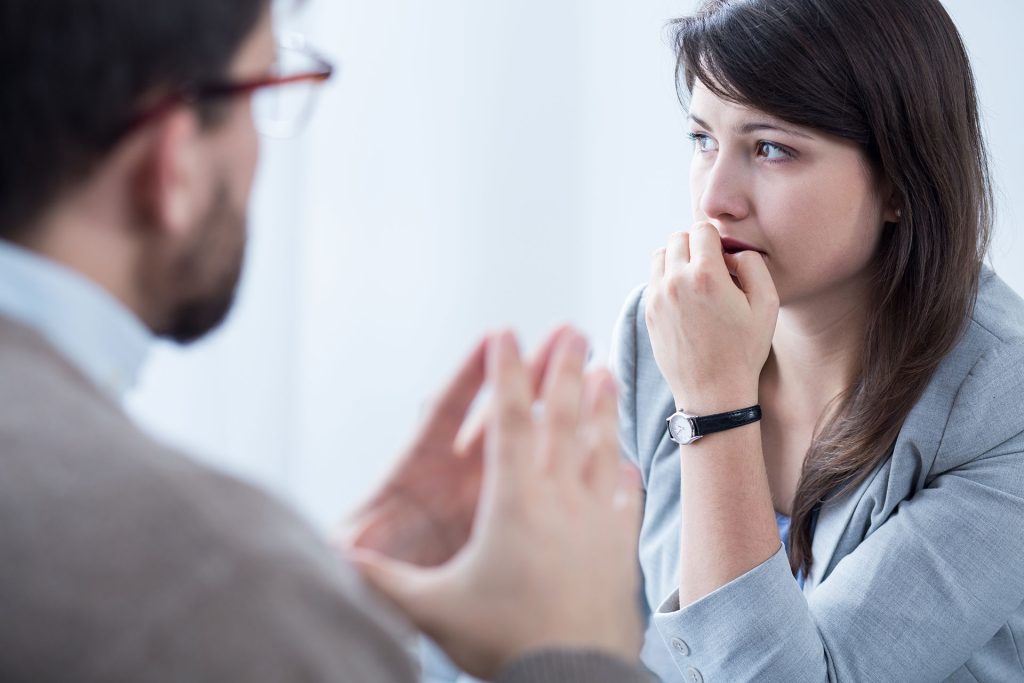 Man Communicating with Woman Fingers Joined Victims of Crime VOCAT Secure Minds Psychology